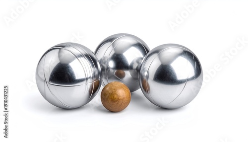 Four metallic spheres and one wooden ball, arranged against a white backdrop. Three shiny silver balls surround a small, brown sphere