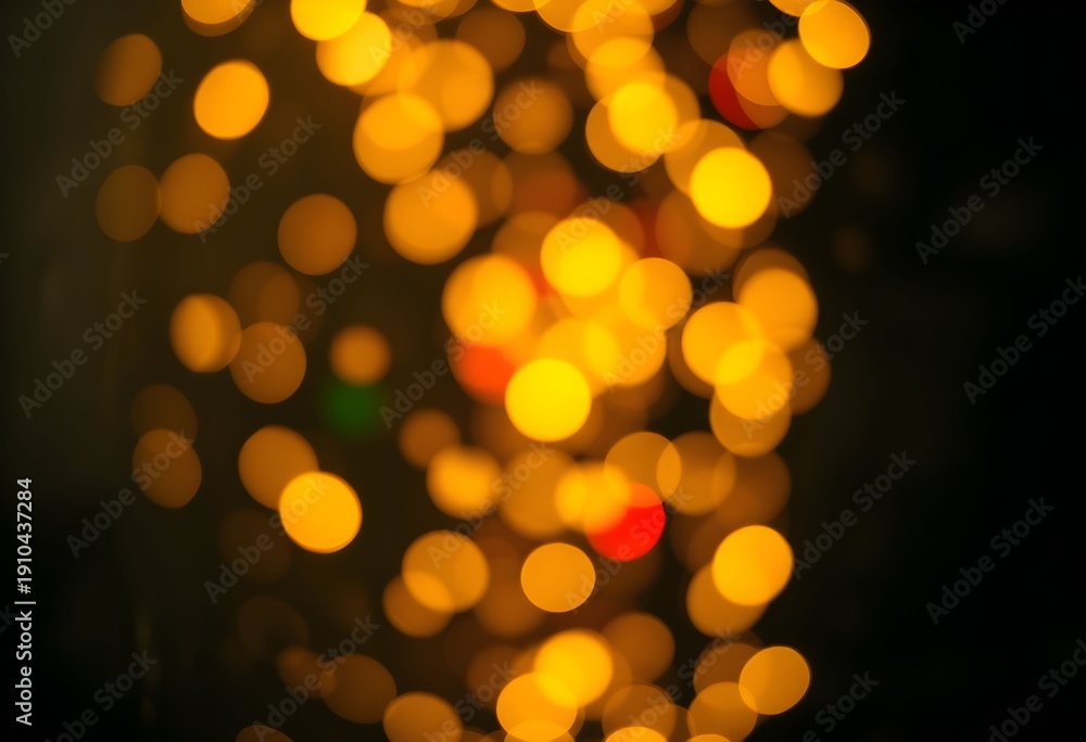 Fototapeta premium A vibrant display of glowing lights creates a mesmerizing bokeh effect against a dark background at night.
