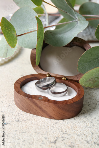 Silver wedding rings in woo...