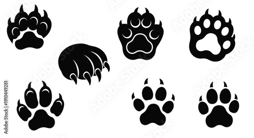 Black silhouettes of animal paw prints and a claw design