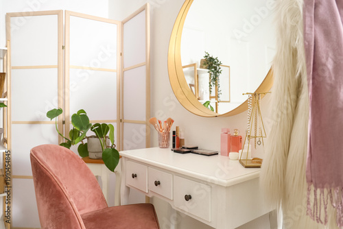 Table with cosmetics, acces...