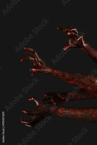 Many hands of zombies on bl...