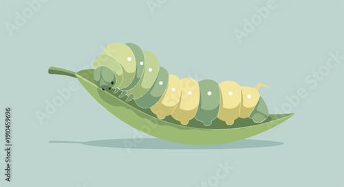 Cute caterpillar resting on a green leaf