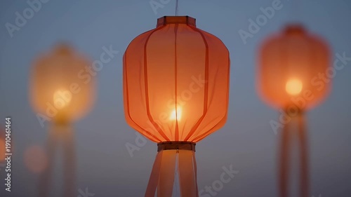Wallpaper Mural Beautiful Orange Lanterns Floating in the Night Sky Above the City Buildings with Bokeh Lights Torontodigital.ca