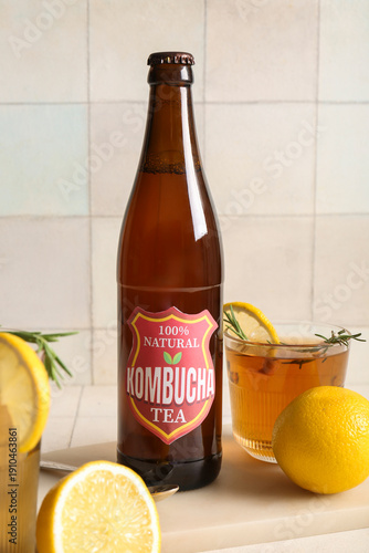 Bottle and glass of tasty k...