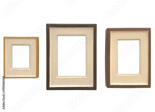 Fotografie Set of three wooden picture frames with beige mat passepartout isolated on white background