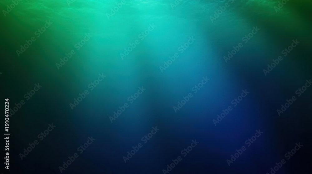 Obraz premium sunlight beams filtering through a green-tinted ocean surface into deep blue water, tranquil and mysterious underwater scene