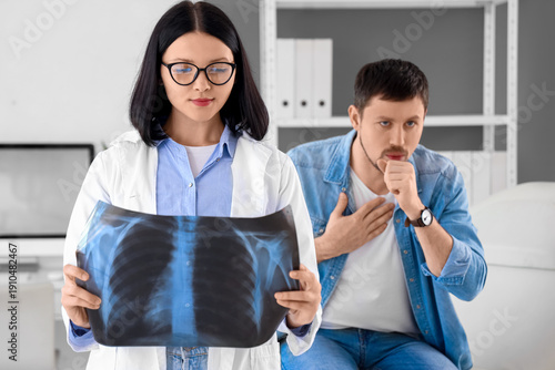 Female doctor with coughing...