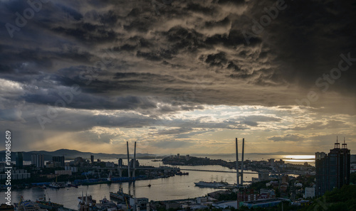Epic storm clouds over Vladivostok city and Golden bridge.