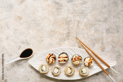 Plate with tasty sushi roll...
