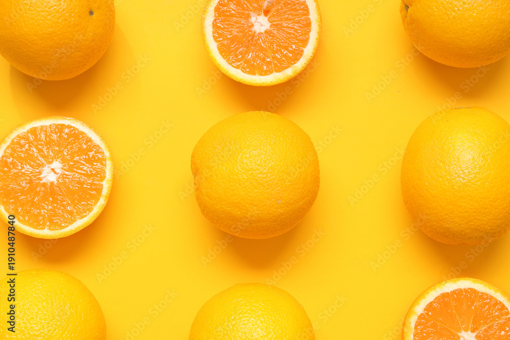 Fototapeta premium Composition with ripe tasty oranges on orange background, closeup
