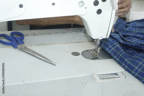 Sewing Tools and Equipment with a Sewing project on a Boutique Shop
