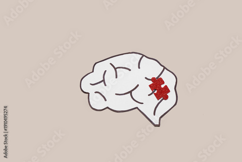 Paper brain and puzzle piec...