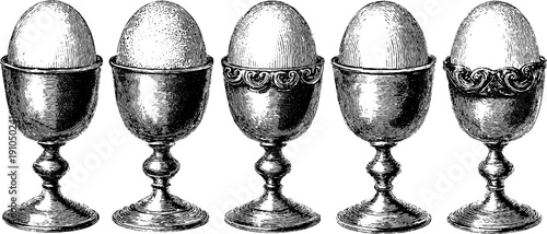 Vintage engraved egg cup set collection in bold black lines for retro kitchen decor