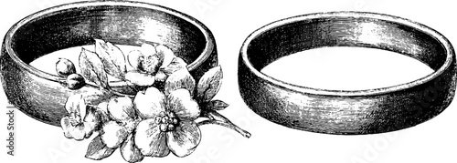 Elegant vintage wedding program card design with engraved rings and floral motifs