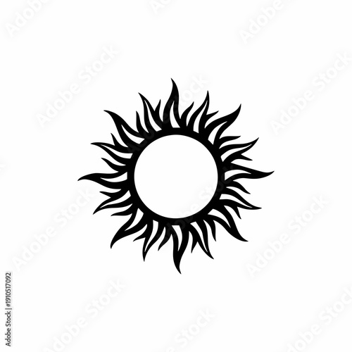 Black tribal sun tattoo icon with flame rays isolated on white background