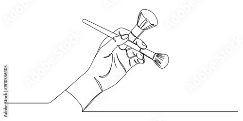 Continuous one line of a hand holding a makeup brush, representing beauty and artistry, drawn illustration.
