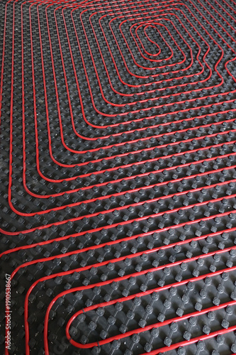 Tubes of radiant underfloor heating installation