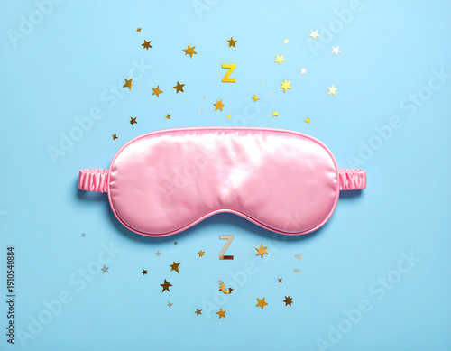 Wallpaper Mural Pink satin eye mask on light blue, with gold stars & Zs scattered around Torontodigital.ca