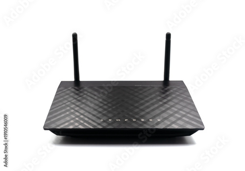 Modern black wireless Wi-Fi router with two antennas isolated on white background. Front view. Concept of home networking, internet technology and wireless connection.