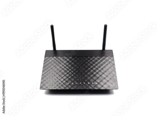 Modern black wireless Wi-Fi router with two antennas isolated on white background. Front view. Concept of home networking, internet technology and wireless connection.