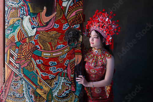 Fotografie Portrait of a young woman and elaborate headdress celebrating Chinese New Year 2