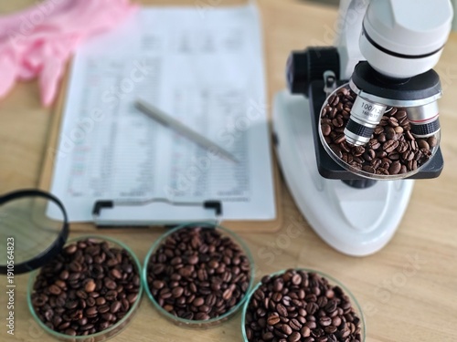 Wallpaper Mural Coffee beans under microscope at lab with notes and tools visible on table during coffee analysis process concept Torontodigital.ca