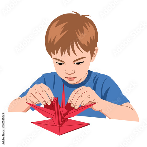 Young boy engaged in origami art, folding red paper.