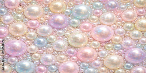 Shiny pink pearl beads and glass spheres create a luxury jewelry texture with abstract bubbles and round blue balls reflecting light in a decorative closeup