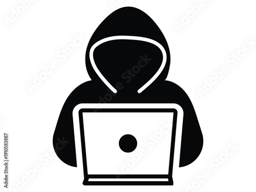 Anonymous hacker silhouette working on computer