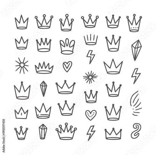 Hand drawn collection of crowns hearts lightning bolts and crystals symbol