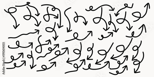 A complex arrangement of hand drawn arrows and loops on a plain white background with no discernible pattern or order