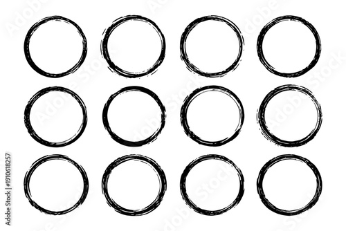 Twelve hand-drawn grunge circles in black on white minimalist design.