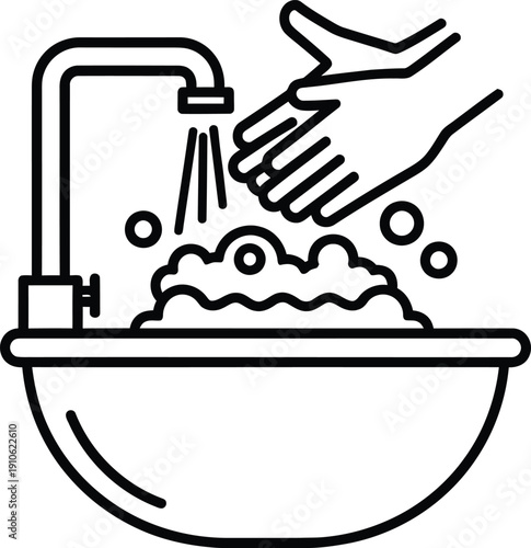 Hand washing under running water in a sink with soap and bubbles.