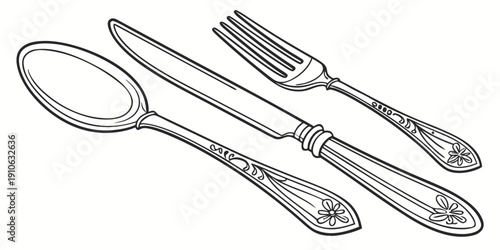 A set of vintage silverware including a spoon, fork, and knife.