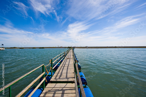 Path Forward Over Water Under Open Blue Sky