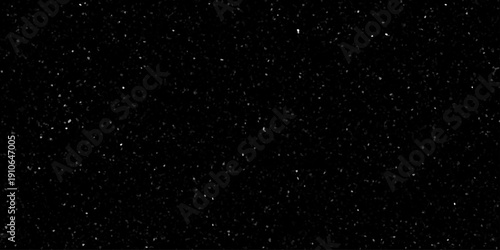 Terrazzo black background with scattered gray and white dots. Rock spatter stone marble backdrop. Black wall texture with noise overlay pattern. Vintage quartz terrazzo flooring.