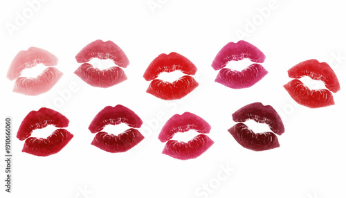 Assorted lipstick kiss marks in various shades of red and pink.