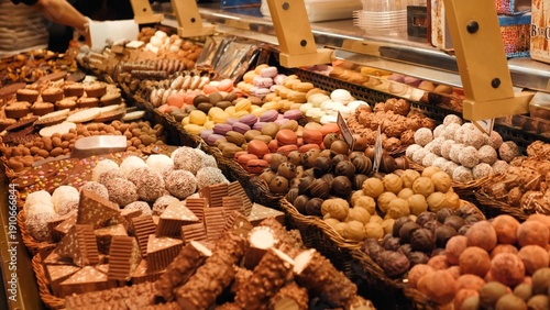 Photos Assorted truffles and pralines in a bakery