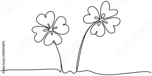 Continuous line drawing of two four-leaf clovers representing luck and nature on a white background. Vector, illustration