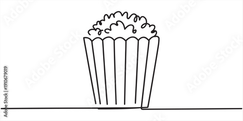 One line drawing of a full popcorn bucket for movie theater snack time concept. Vector, illustration