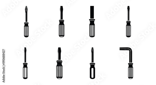Collection of various black and white screwdriver and wrench tools