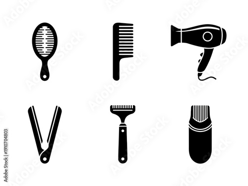 Hair styling tools and accessories on white background