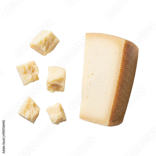 Substantial wedge of hard Italian Pecorino Romano cheese and irregular broken pieces revealing crumbly texture on a transparent studio background, soft lighting, flat lay. Concept of gourmet