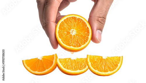 Wallpaper Mural Hand holding a sliced orange segment with three segments below against a black background Torontodigital.ca