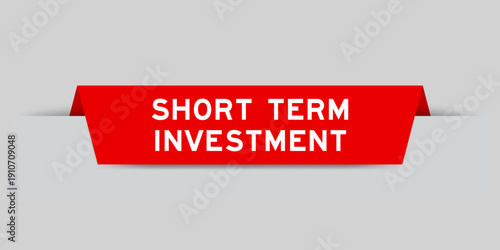 Red color inserted label with word short term investment on gray background