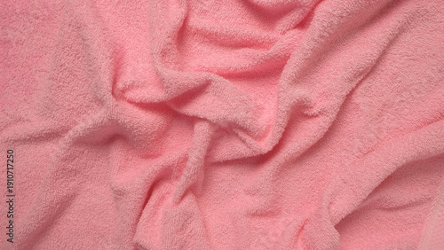 Soft pink wrinkled towel wavy pattern and texture background. For graphic design, 3D rendering and banners