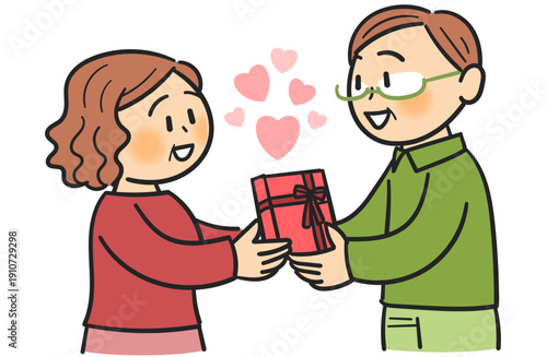 プレゼントを渡して照れ合うシニアのカップル