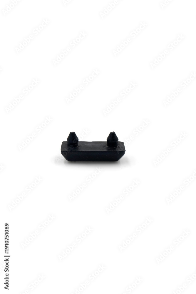 Photos a small, rectangular black rubber bumper or cushion, designed for surface protec