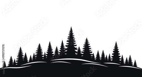 Silhouette of a dense evergreen forest landscape.